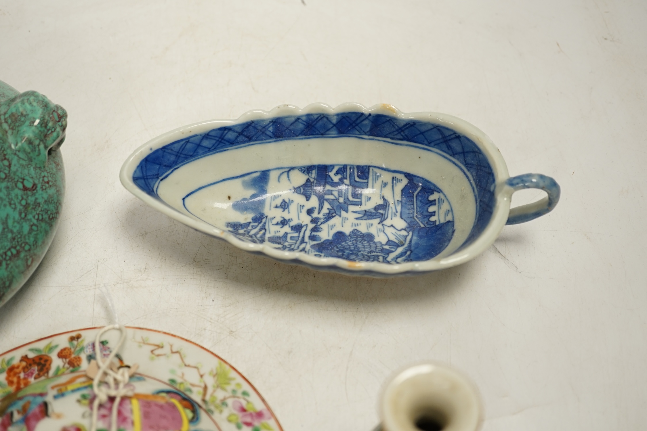 A Chinese robin’s egg glazed censer, a blue and white sauce boat and two famille rose items, largest 17cm diameter. Condition - fair to good